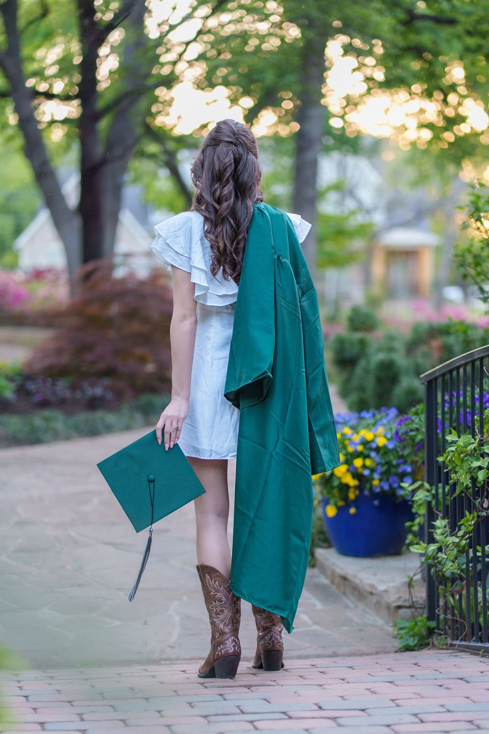 Senior photos 2025 class Los Colinas Irving Texas Mandalay Canal floral dress outfits poses ideas outdoors golden hours graduation
