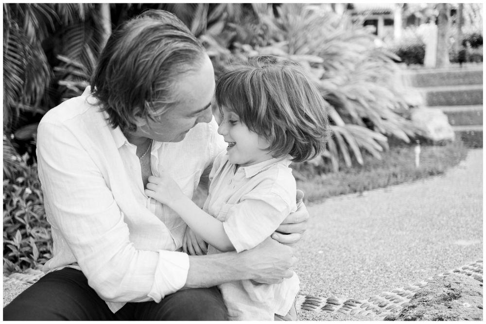 Black and white portrait of a parent and child during a family photography session at St. Regis Punta Mita.