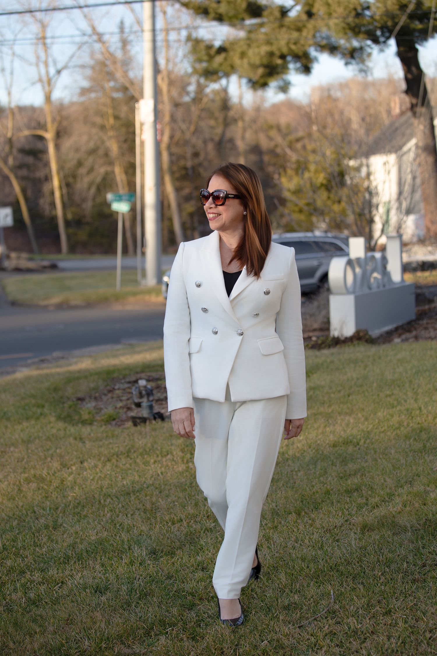 Happy realtor captured in natural light walking | Northern NJ personal branding photography