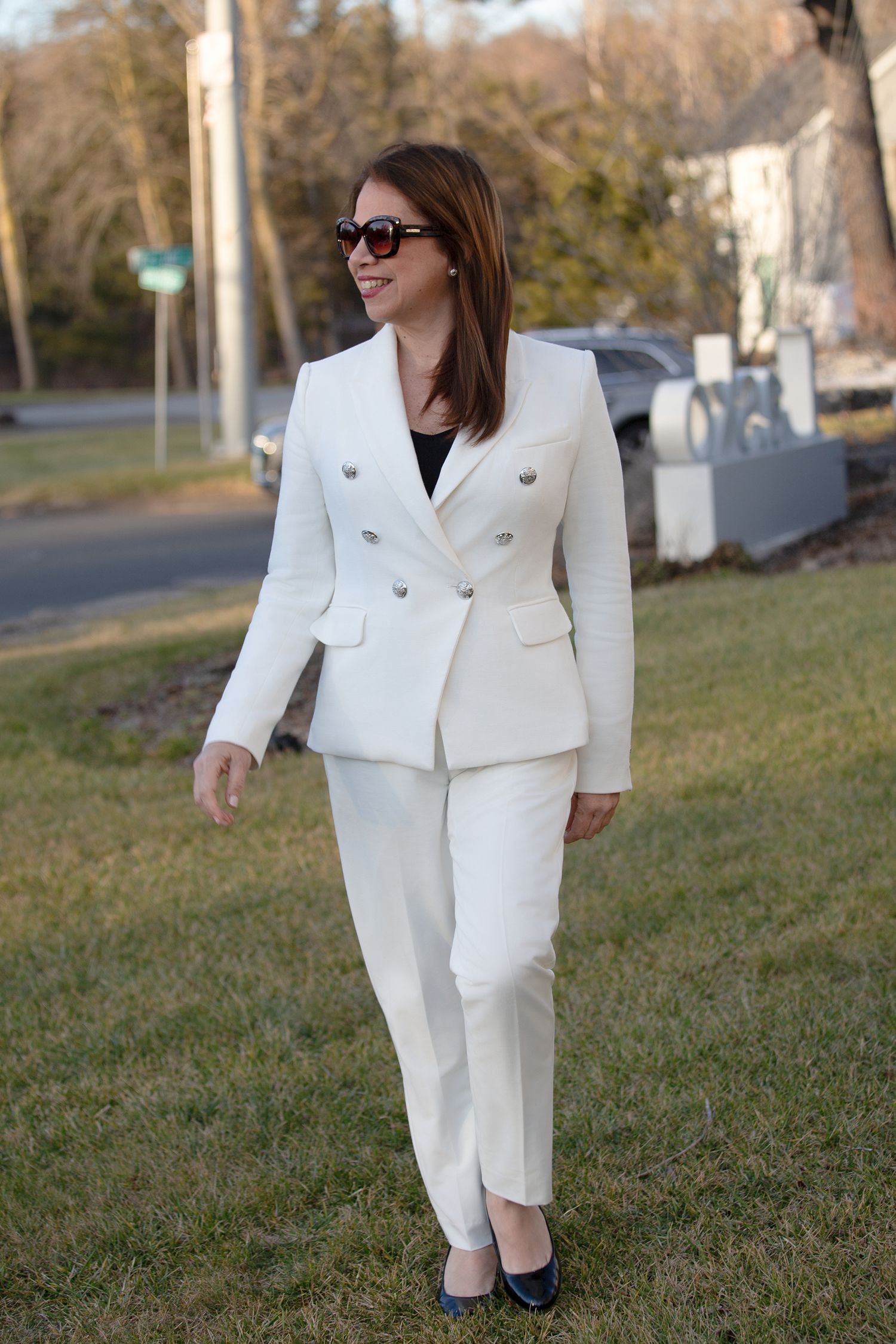 Smiling realtor walking | Northern NJ personal branding photography