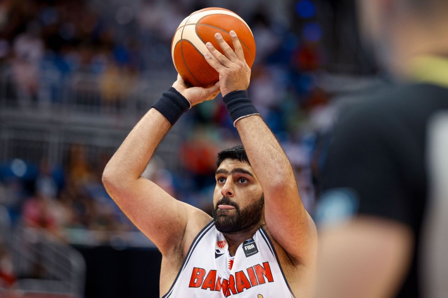 Ali Hasan shoots a free throw during the 2024 FIBA Olympic Qualifying Tournament.