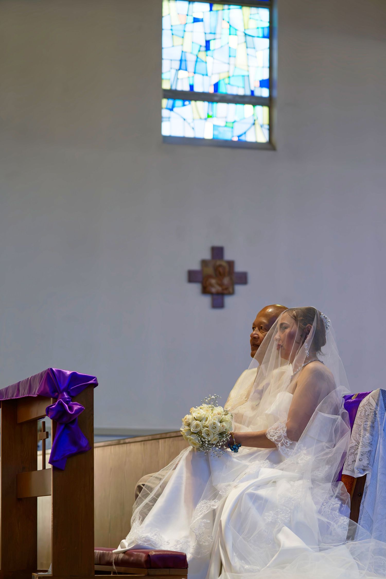 Bride and Groom attending mass. St. Bernadette's Catholic Church Stockton California.