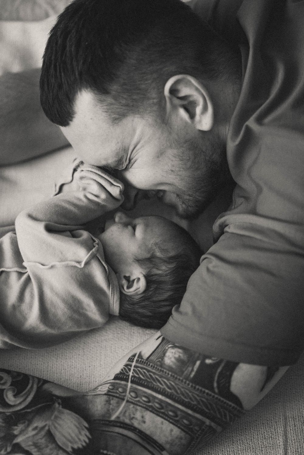 Intimate black and white close-up sequence showing tender moments.