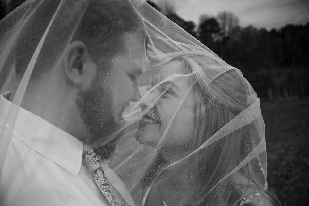 Bride and Groom veil portrait in Alabama