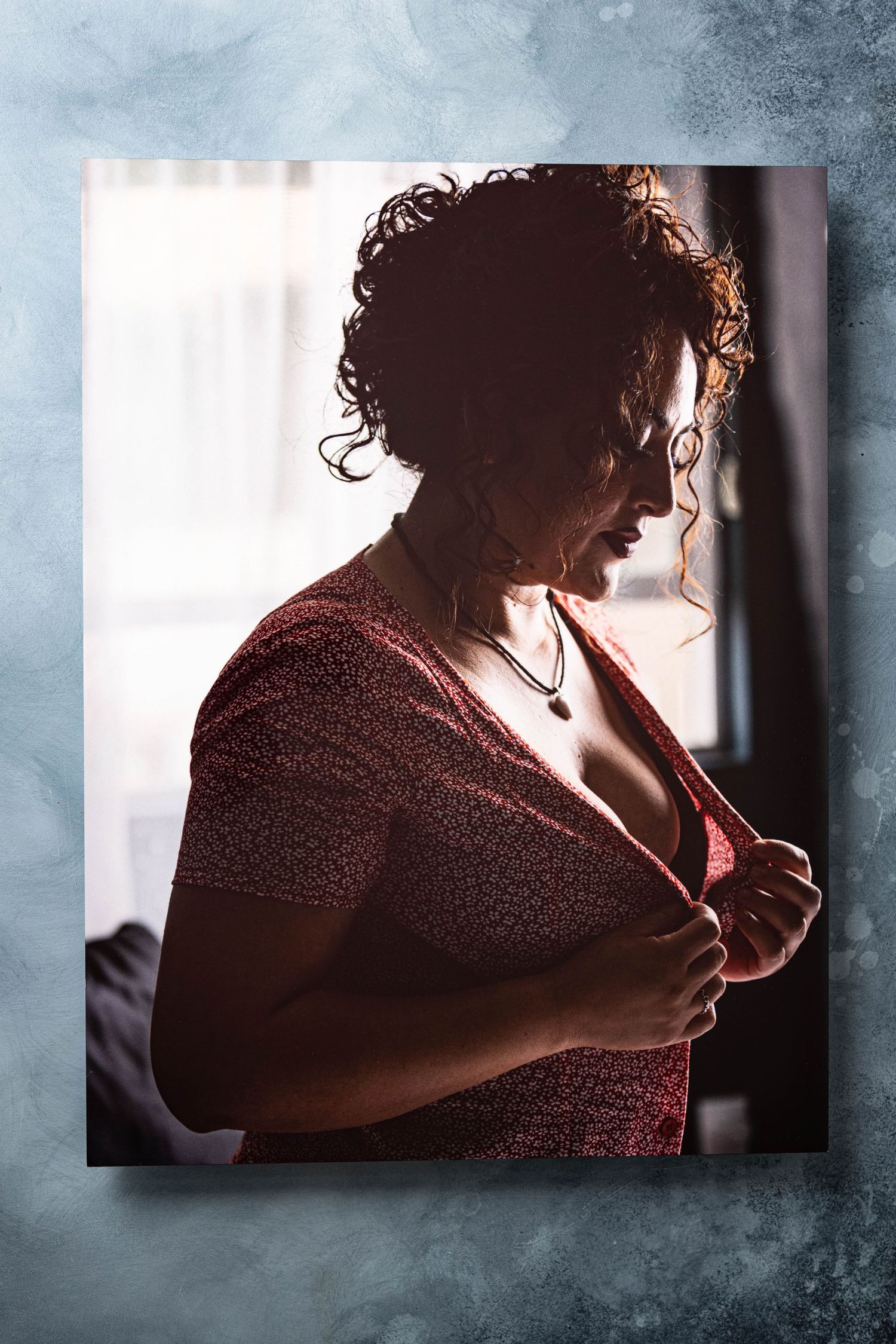 Metallic wall art showing a woman during a boudoir photo shoot captured by Los Angeles photographer.