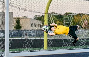 Soccer, Goalie preventing the ball from scoring