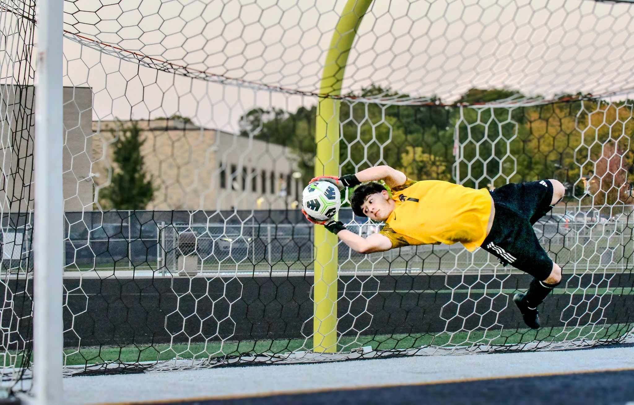 Soccer, Goalie preventing the ball from scoring