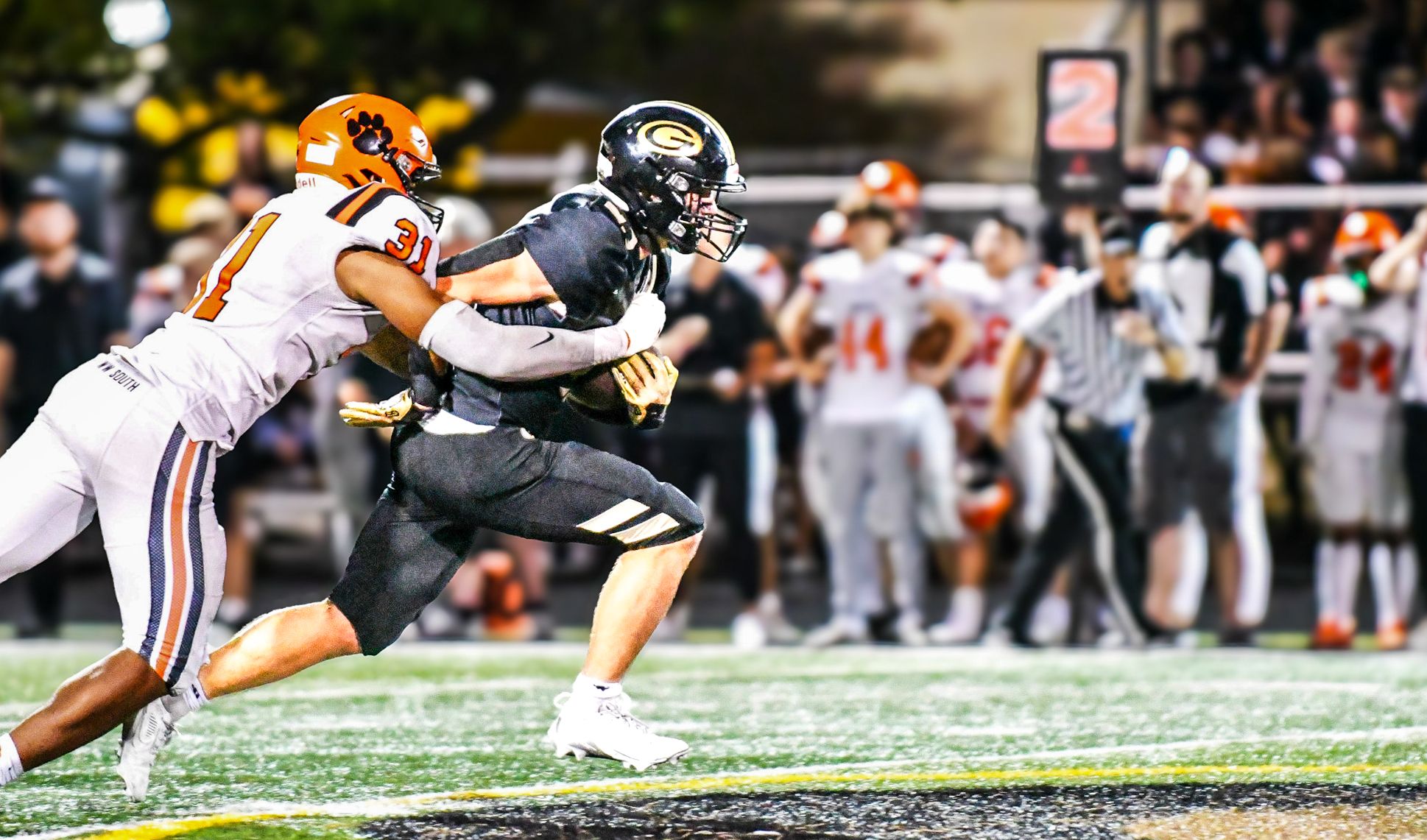 Football, Player breaking through a tackle