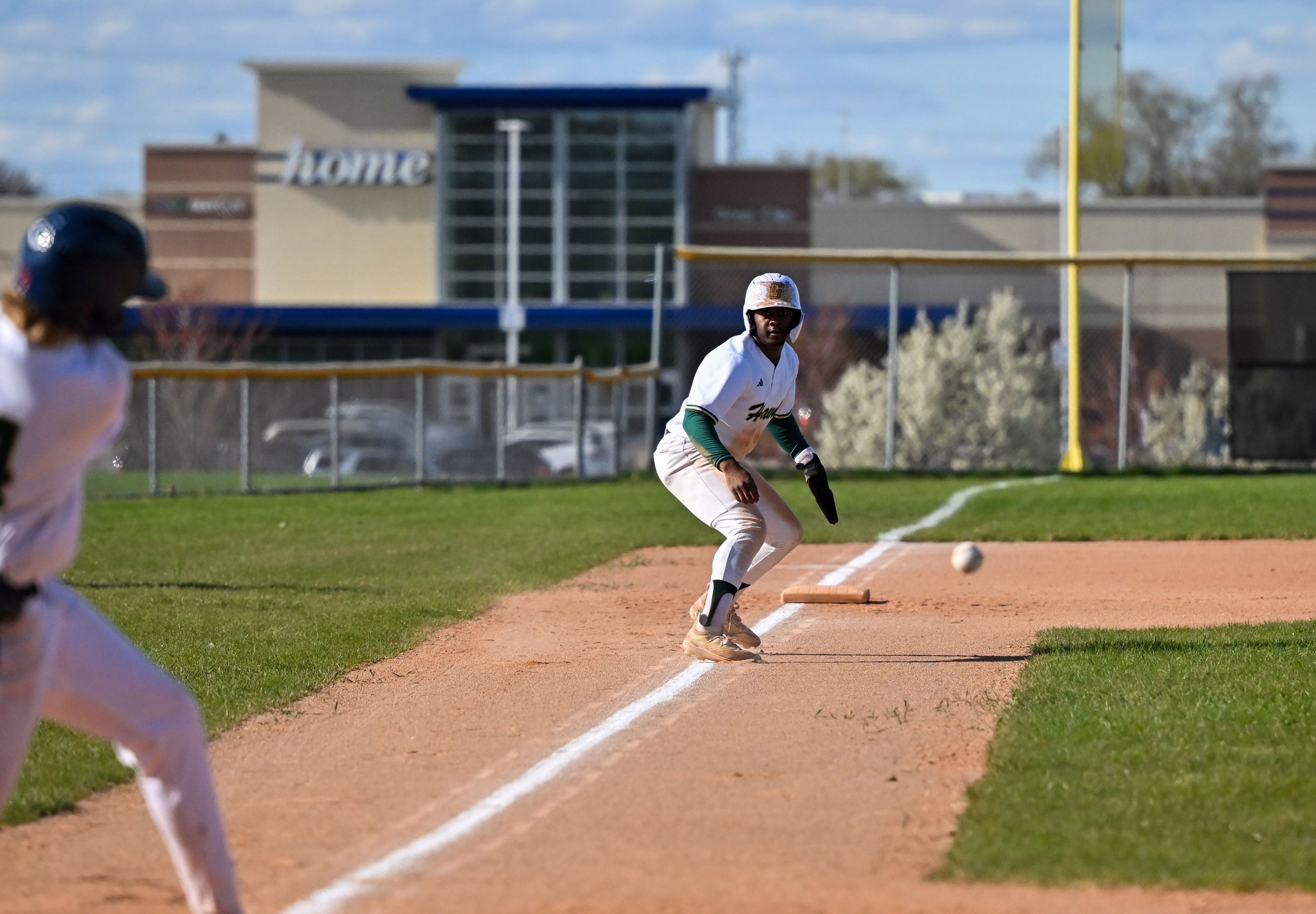 Baseball, Runner on third watching the ball as it's hit.