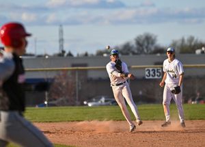 Baseball, Middle infielder throwing to first base.