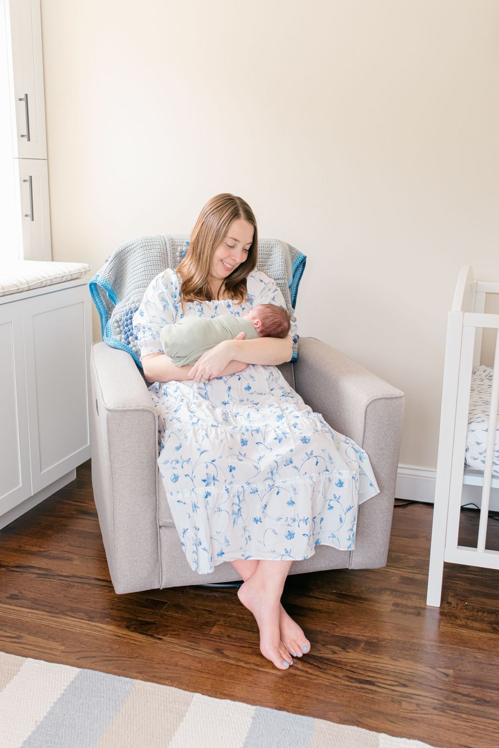 Heartwarming newborn family photo taken in Fair Haven, New Jersey by a professional Monmouth County photographer.