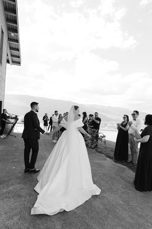 Outdoor Switzerland wedding couple with guests