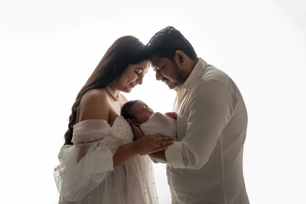 new born baby with parents photography - Jasmeet K Photography