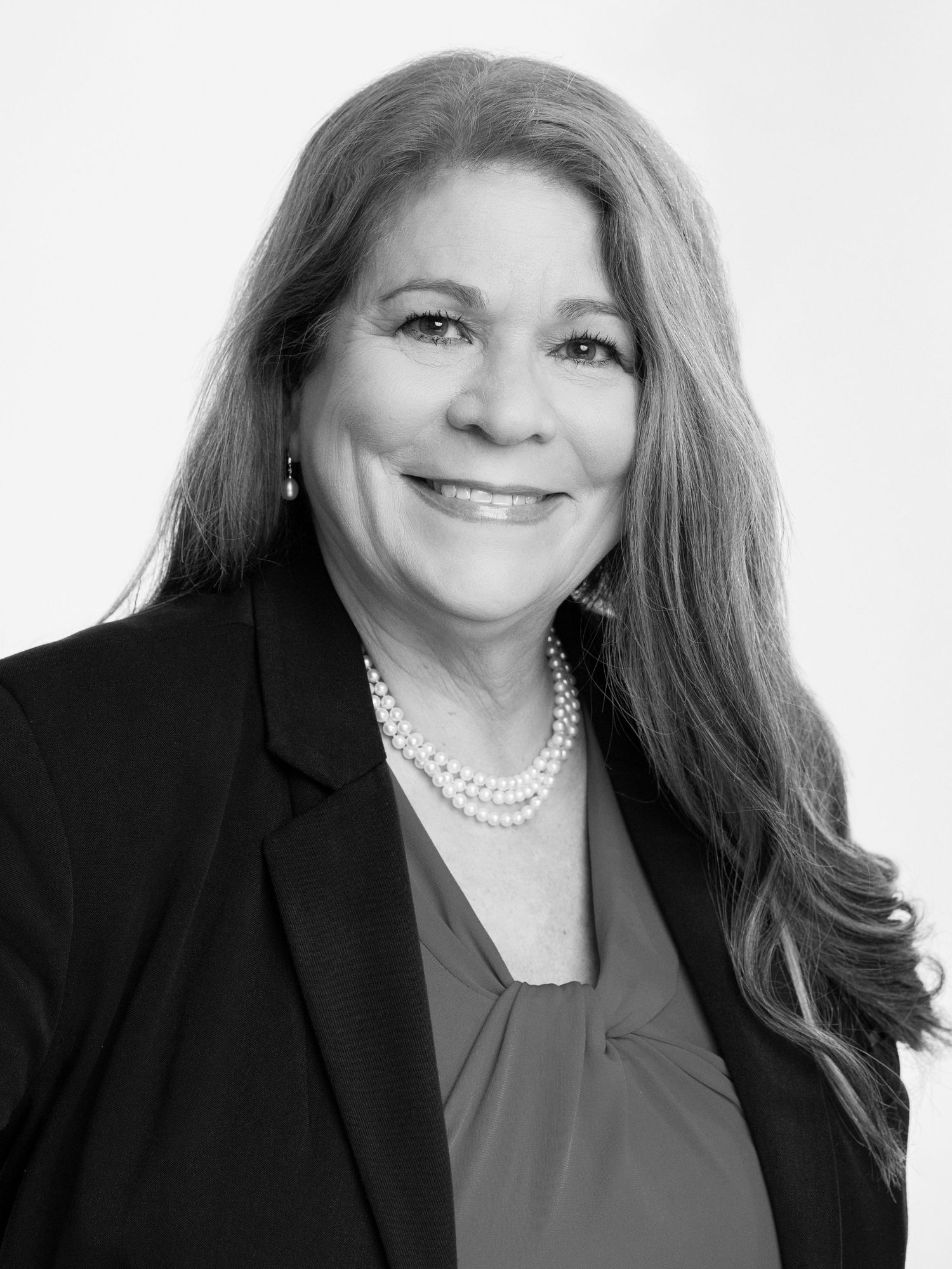 Black and white headshot of a woman taken by Jefferson County headshot photographer