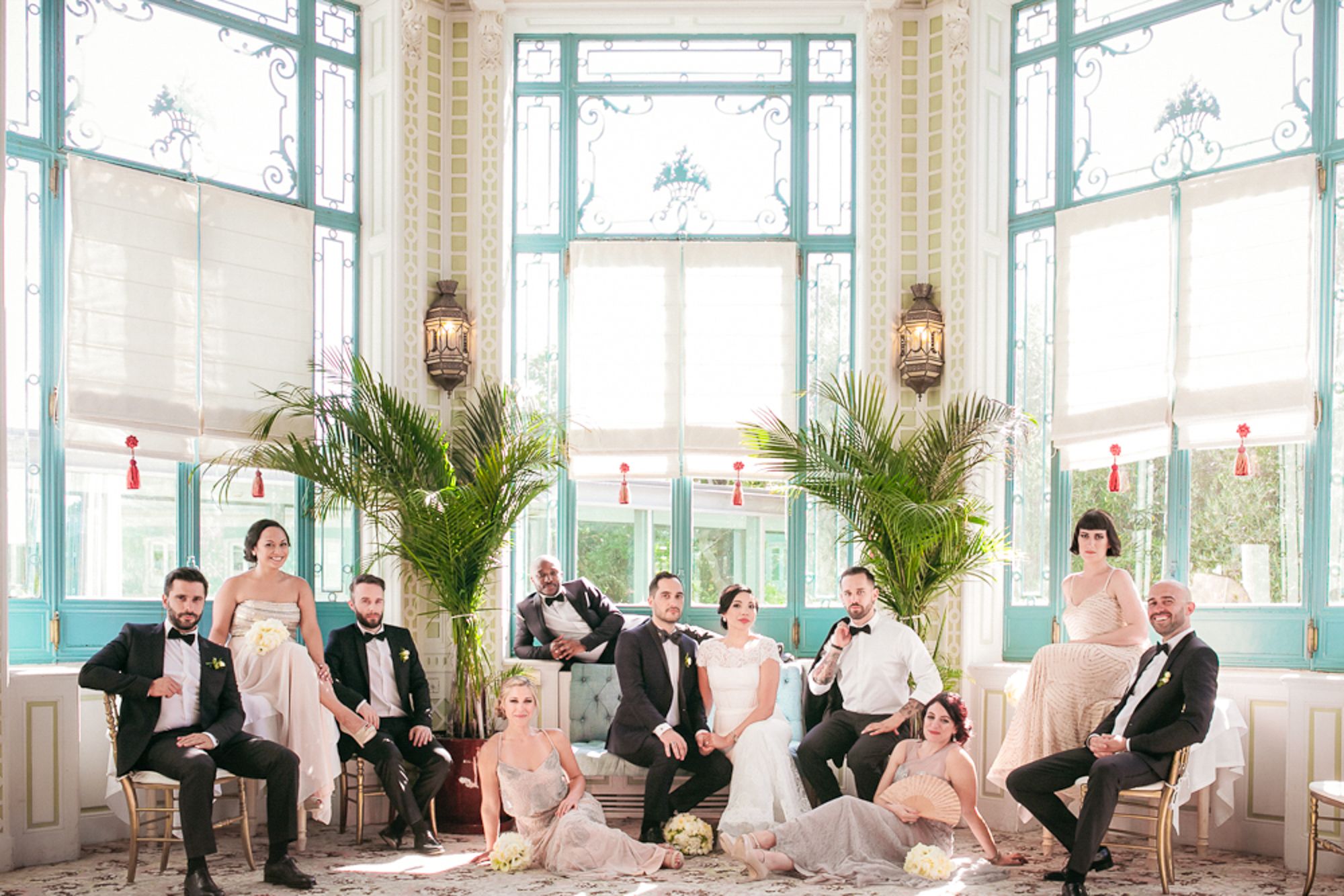bridal party vogue photo in an elegant French-style at Lisboa Pestana palace. Captured by a destination wedding photographer in Portugal