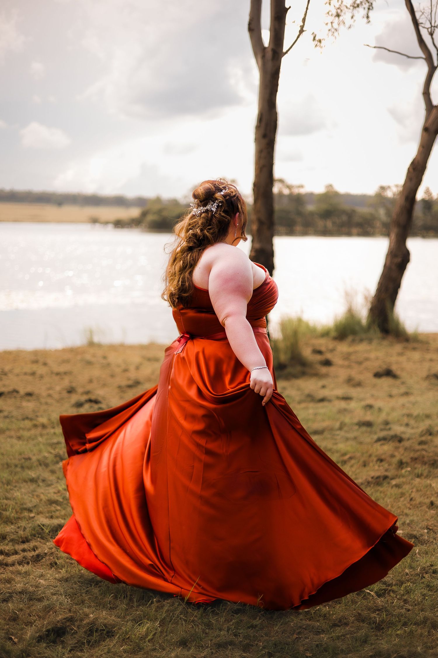 Formal photoshoot at Dam in South Burnett, featuring a person in an elegant formal dress for grade 12 graduation Nanango, Kingaroy Murgon