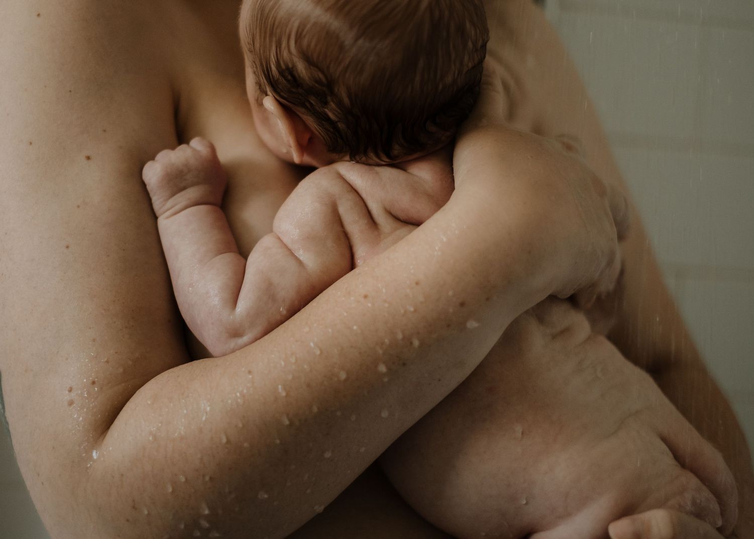 Intimate black and white portrait showing tenderness and connection.