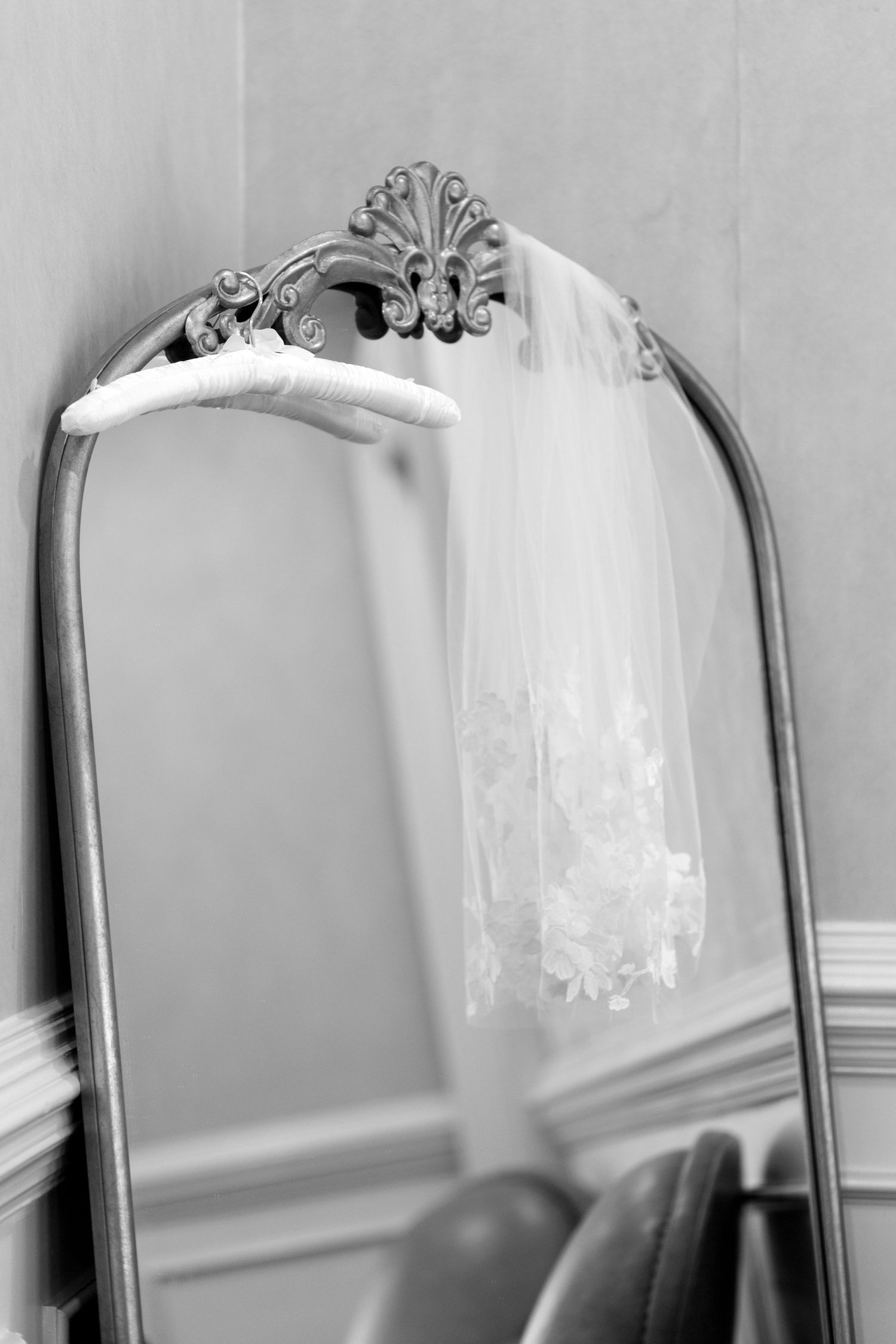 Vintage-style mirrors with ornate frames displayed in a row.
