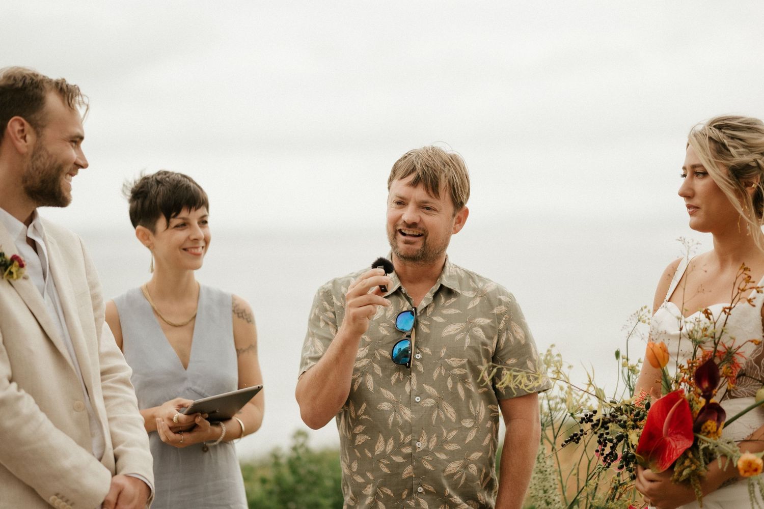 A joyful moment captured during an outdoor wedding ceremony.