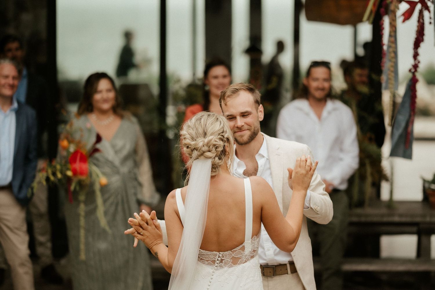 Dancing newlyweds celebrate during their wedding reception.