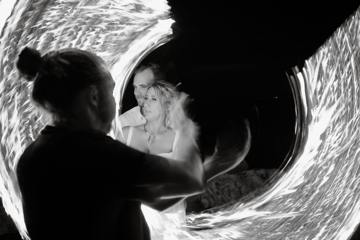 Artistic black and white silhouette photo through circular frame.