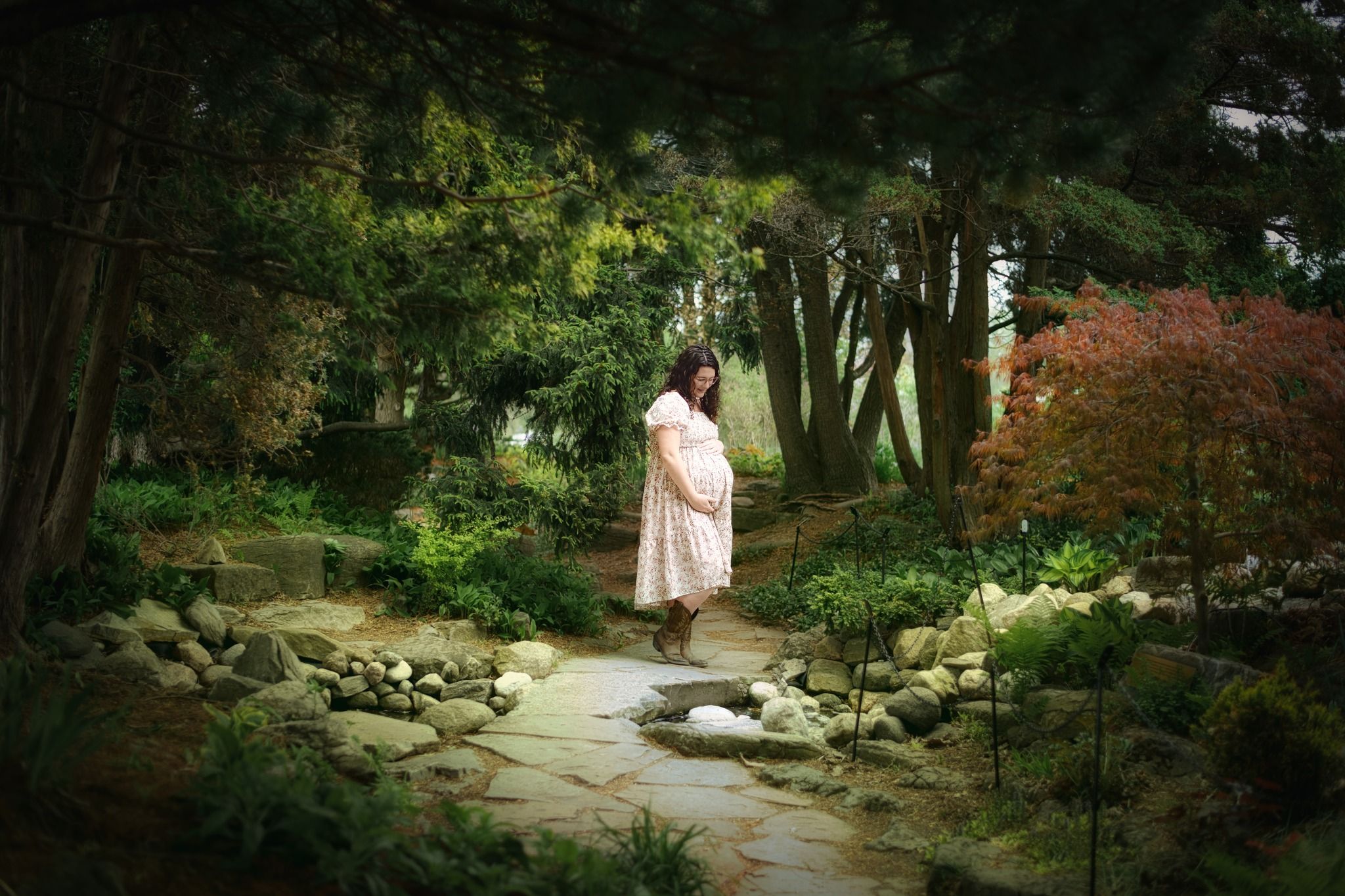 A collection of garden pathway images featuring stone walkways winding through lush green landscaping.