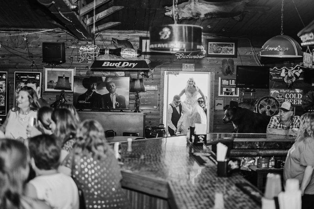 Black and white photo collage showing crowded bars and nightlife scenes with neon signs and patrons socializing.