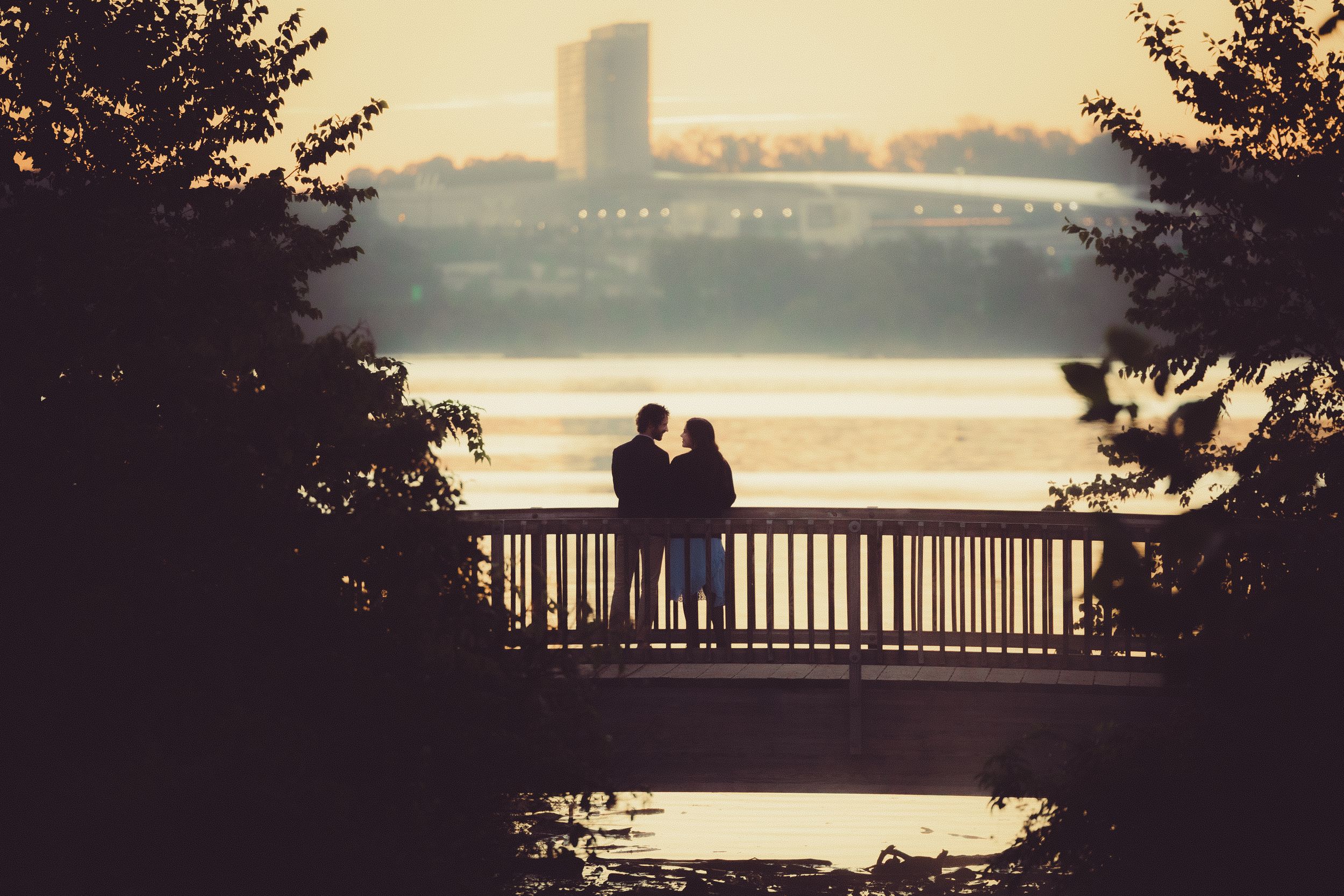 Romantic sunrise engagement photos on the Alexandria Waterfront overlooking the Potomac River