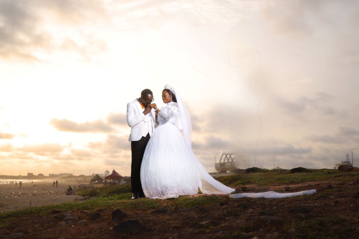 Wedding photography sequence at sunset showing romantic poses against a golden sky.