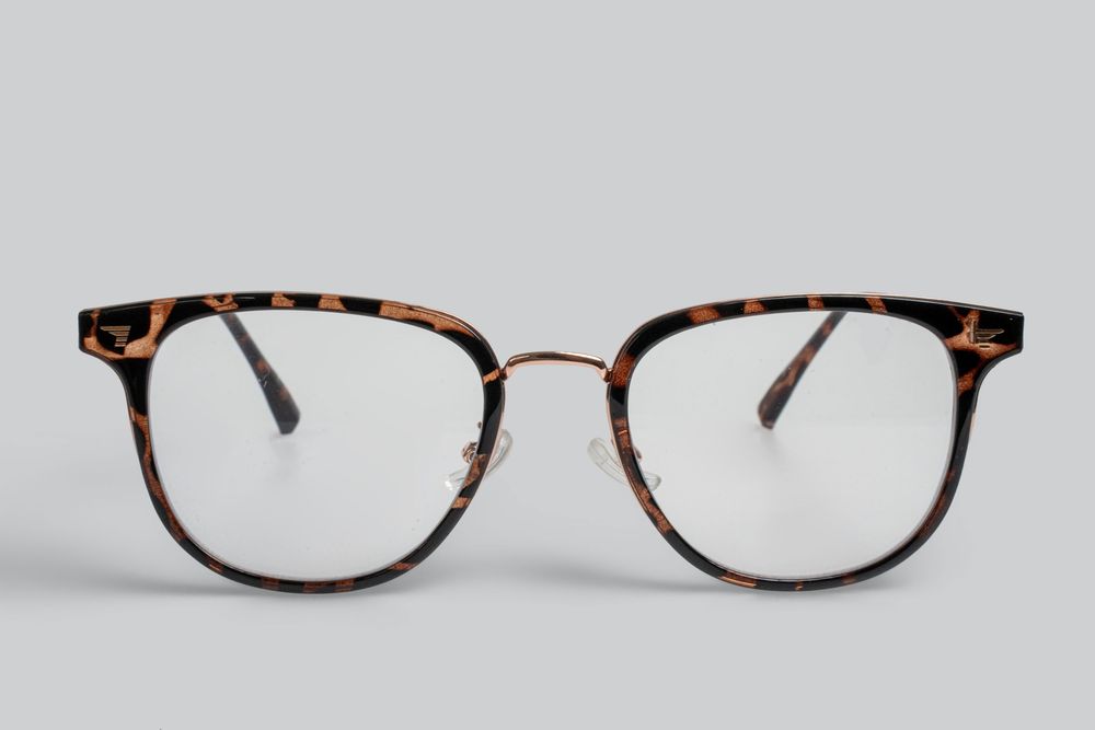 High-quality commercial product photography of stylish eyewear and sunglasses, shot in an Auckland photography studio.