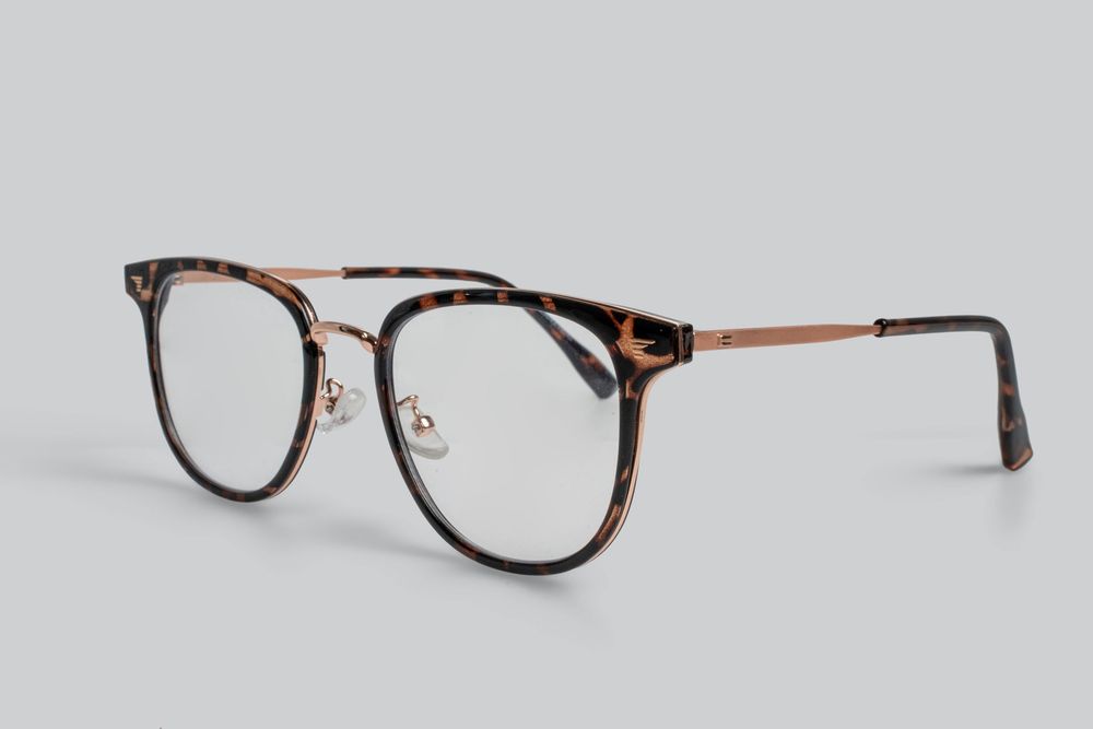 High-quality commercial product photography of stylish eyewear and sunglasses, shot in an Auckland photography studio.