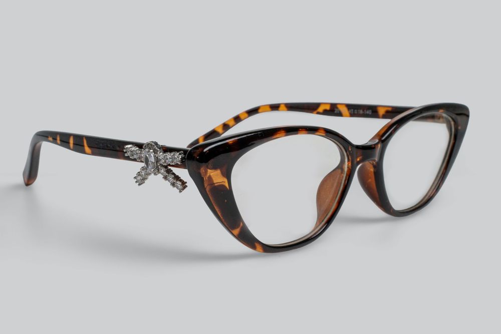 High-quality commercial product photography of stylish eyewear and sunglasses, shot in an Auckland photography studio.