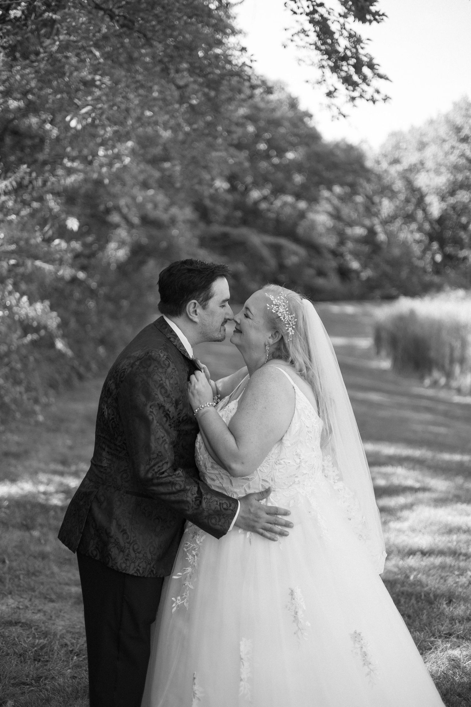 Bride and groom golden hour, lakeside, outdoor portraits in Chatham, Illinois