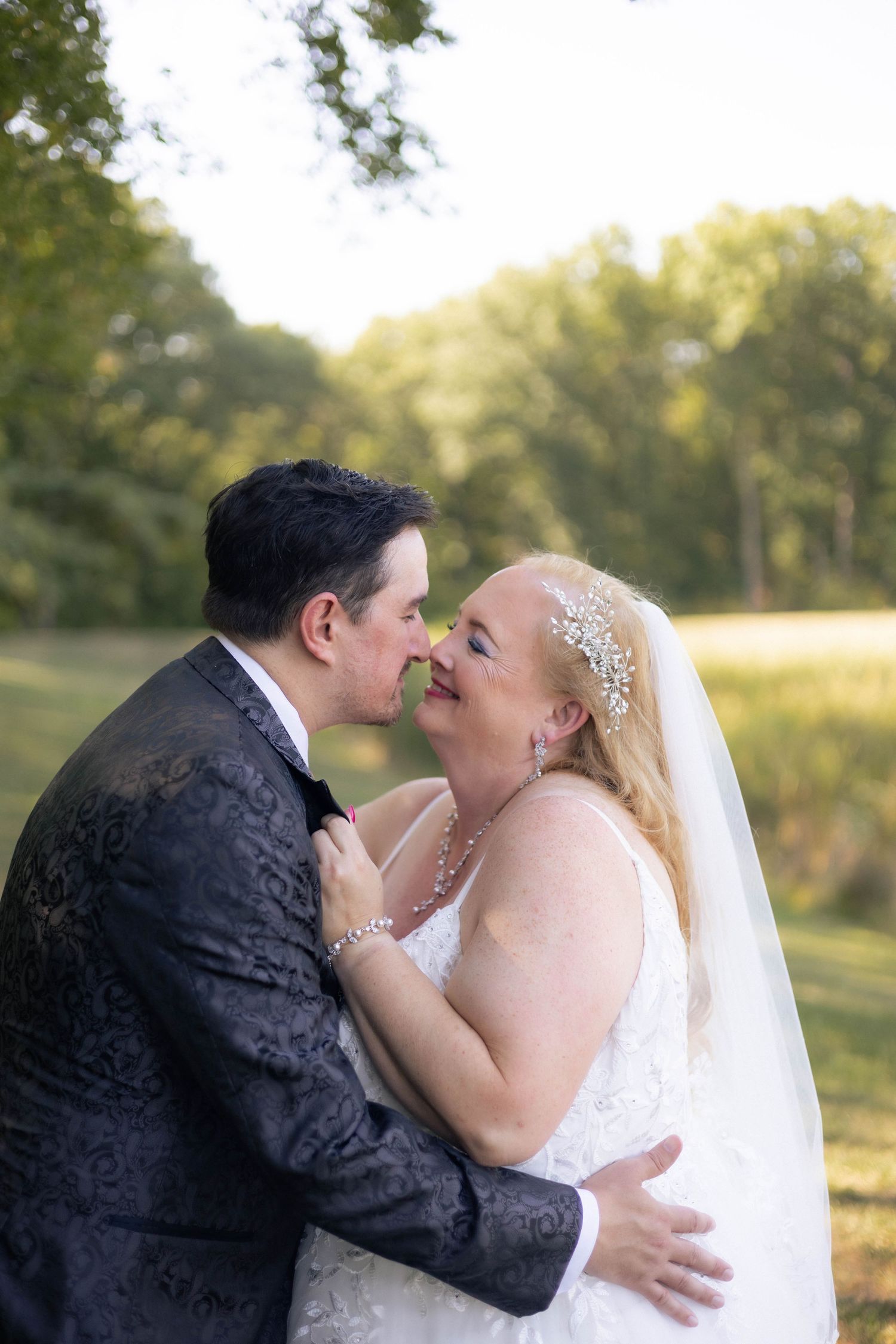 Bride and groom golden hour, lakeside, outdoor portraits in Chatham, Illinois