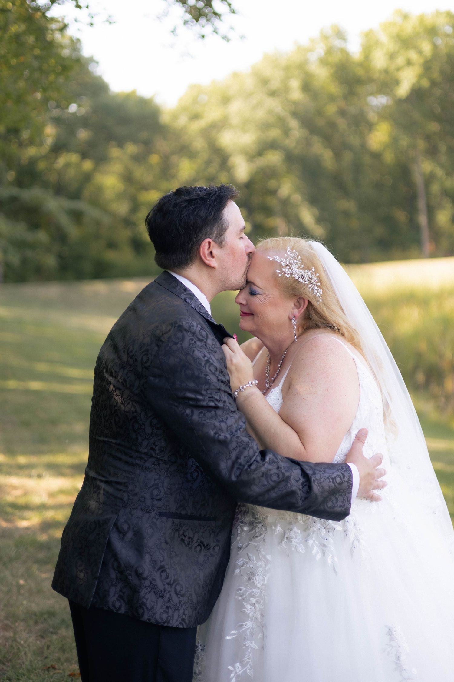 Bride and groom golden hour, lakeside, outdoor portraits in Chatham, Illinois