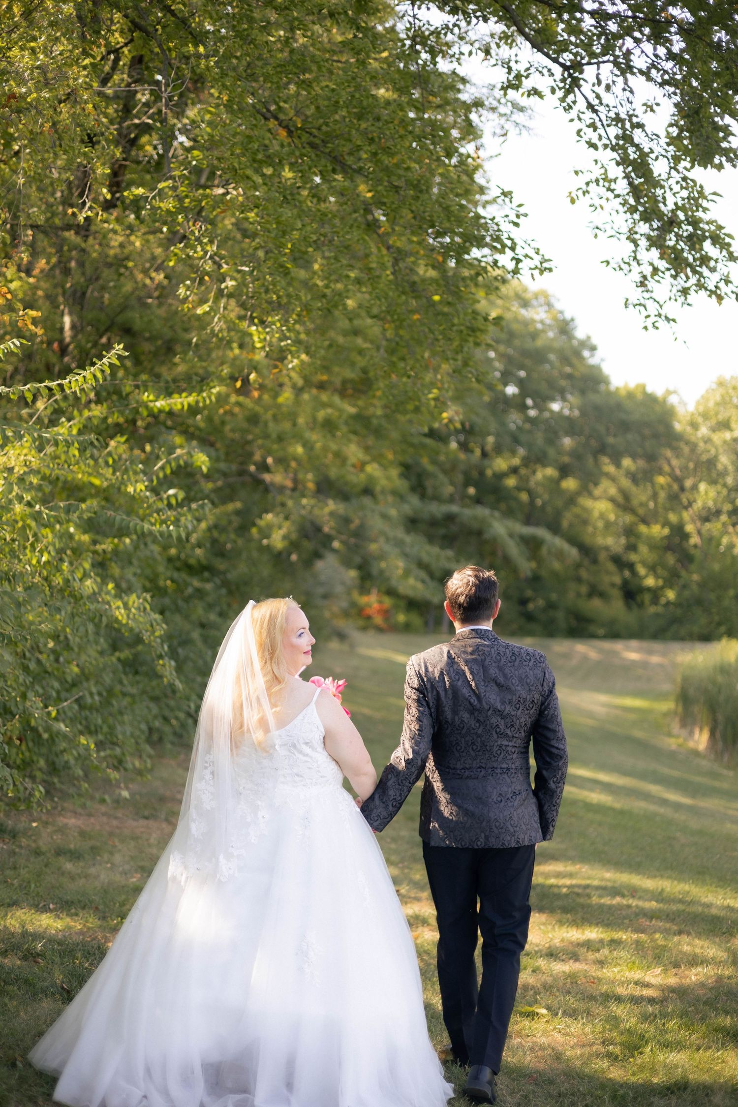 Bride and groom golden hour, lakeside, outdoor portraits in Chatham, Illinois