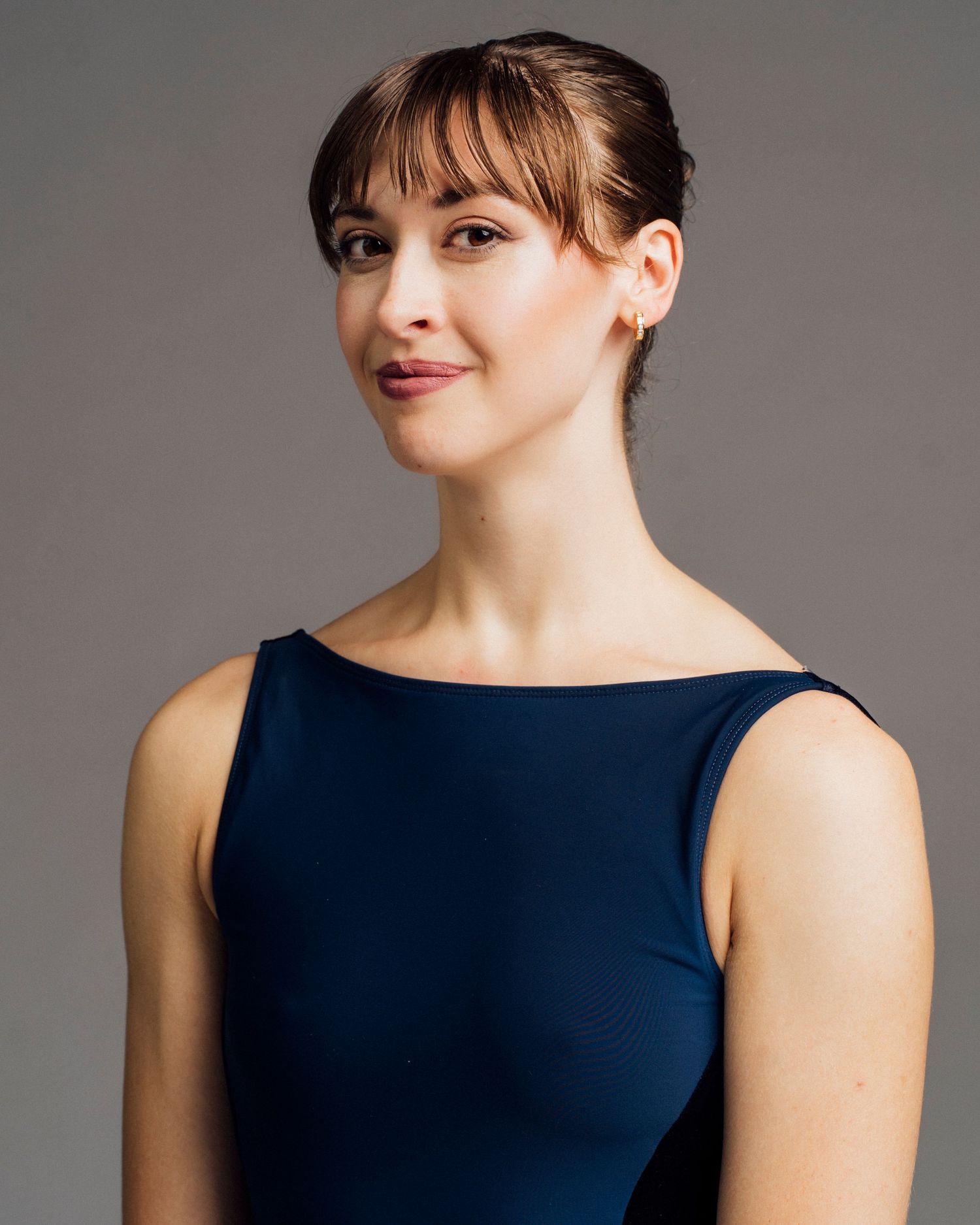 Ballet headshot photographer in Chicago photographing ballerina with professional studio light for audition portfolio
