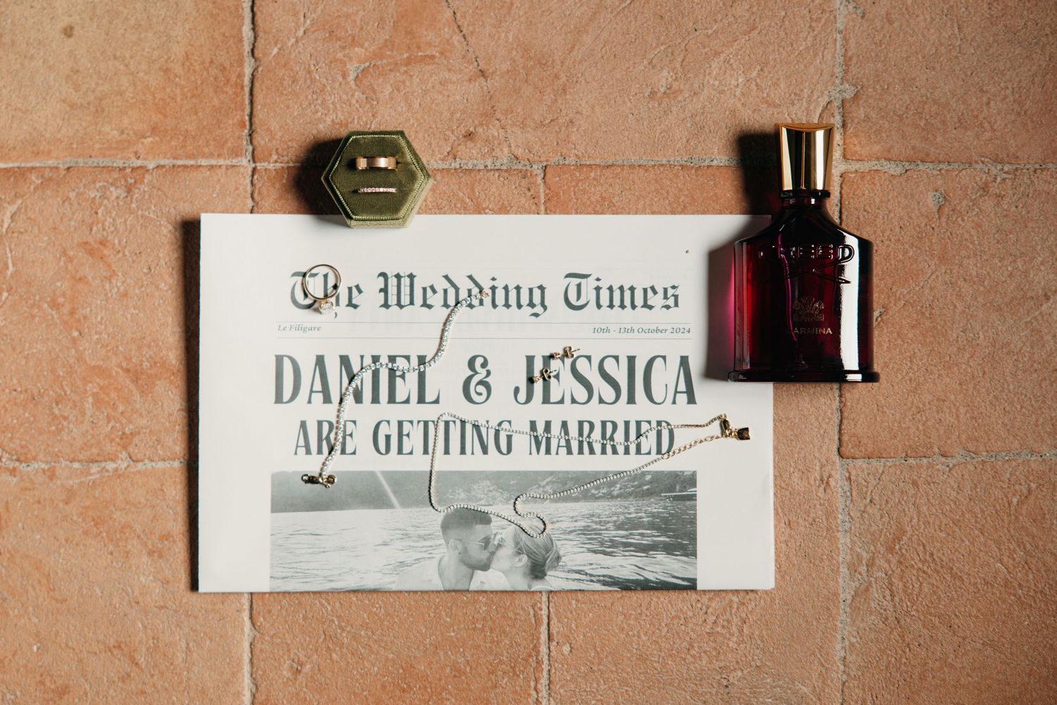 Vintage style wedding announcement newspaper clipping with a perfume bottle.