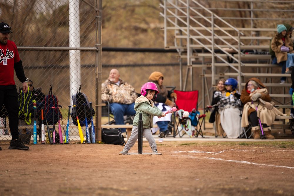 Sports photography teeball girl swinging the batt at Petroglyph Little League by Memorari Portrait