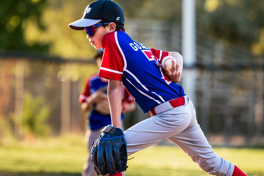 Baseball Pitcher preparing to pitch the ball in Albuquerque Little Leage