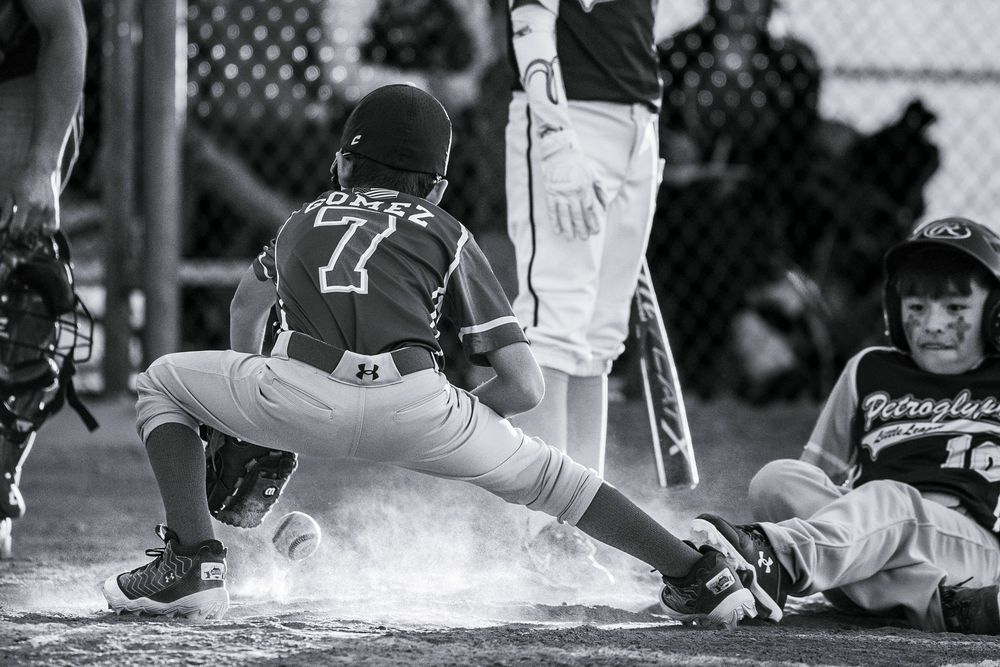 New Mexico Little League Baseball Sports Photography, showcasing pitcher hitting home plate