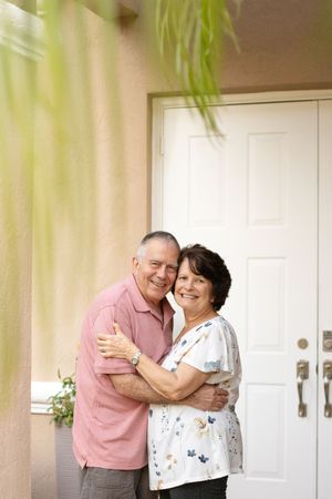couple looking at camea and smiling