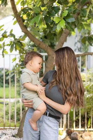 mother rocking baby boy
