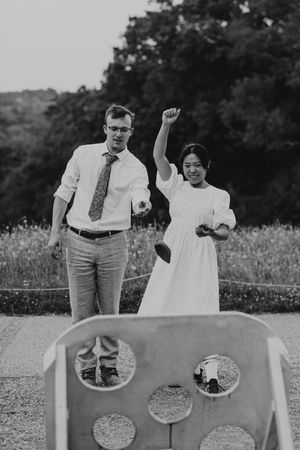 Natural wedding photography  , garden games at Nymans Gardens National Trust
