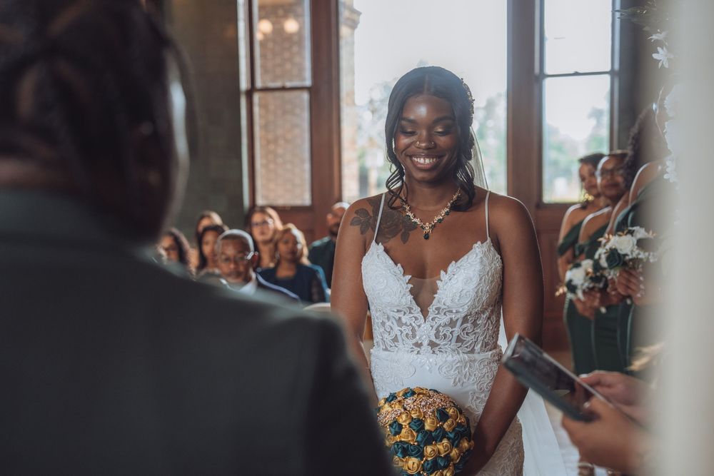 Wedding ceremony moments captured in an elegant indoor venue.
