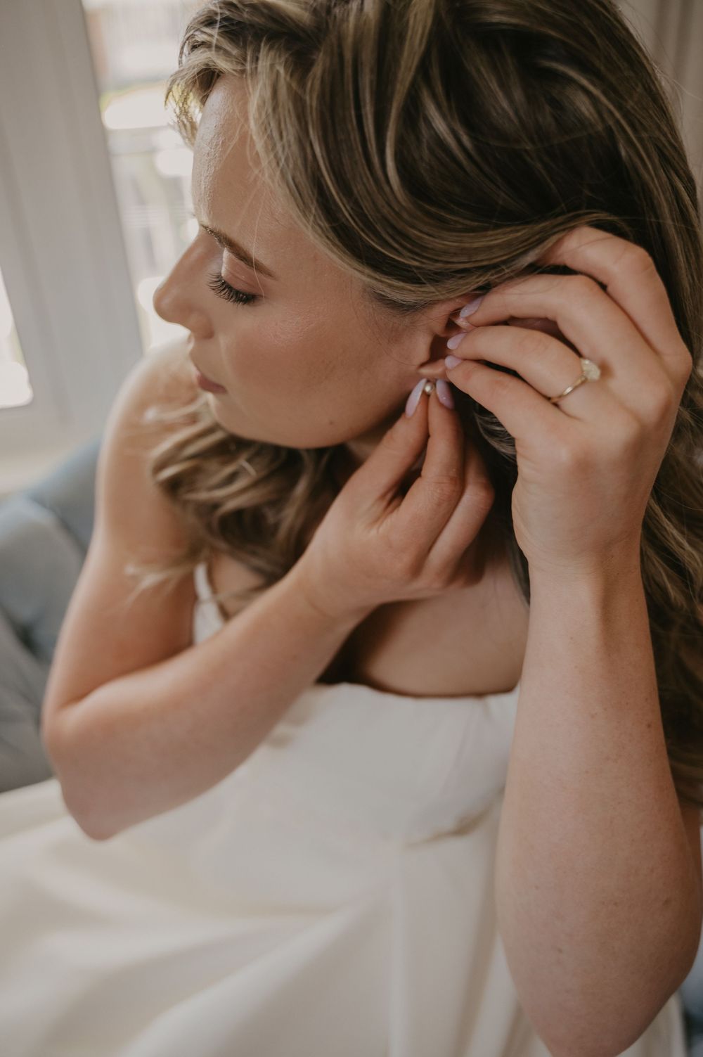 A series of emotional getting ready moments captured in soft natural light.