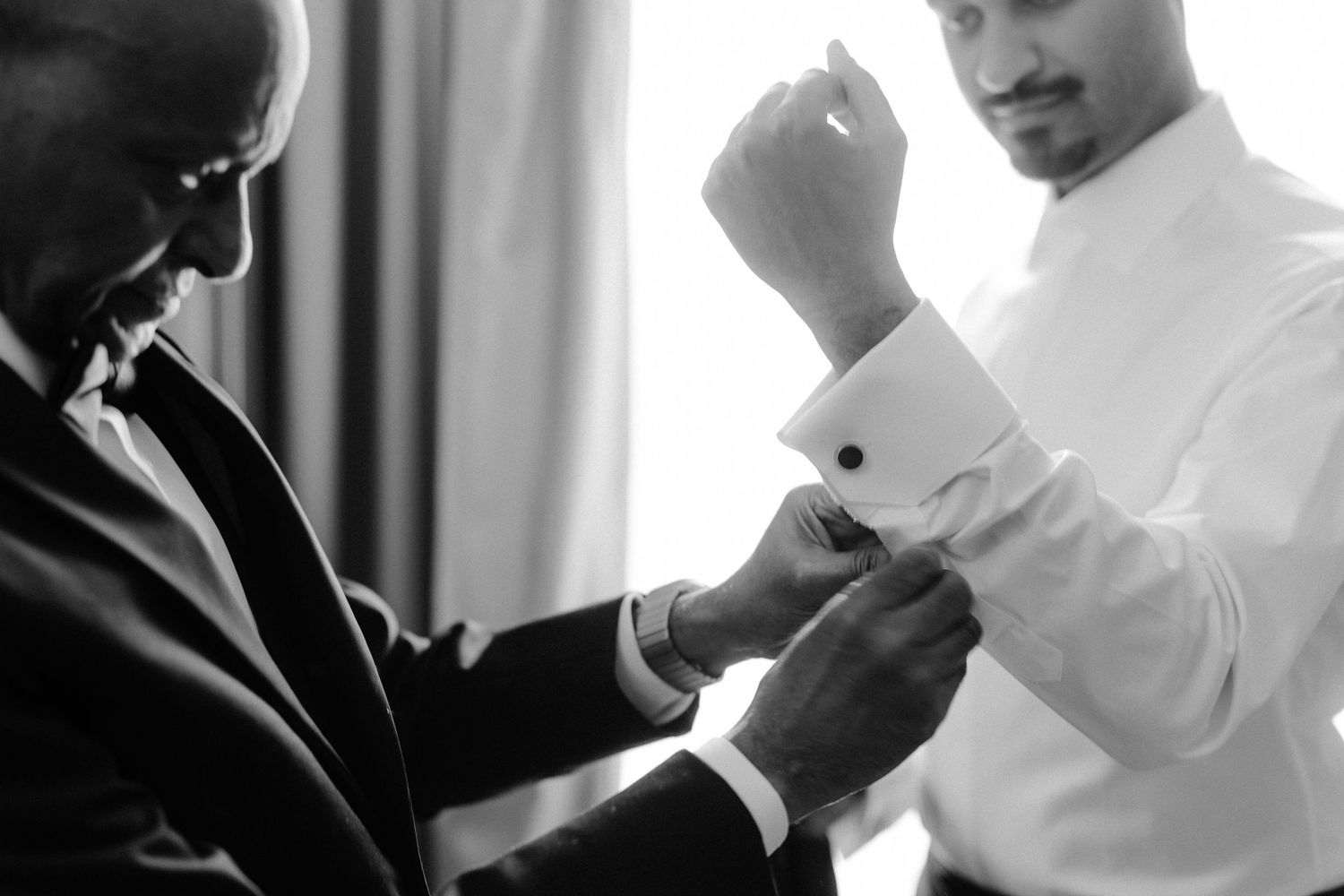 A black and white photo montage shows intimate moments during a wedding ceremony with couples in formal attire.