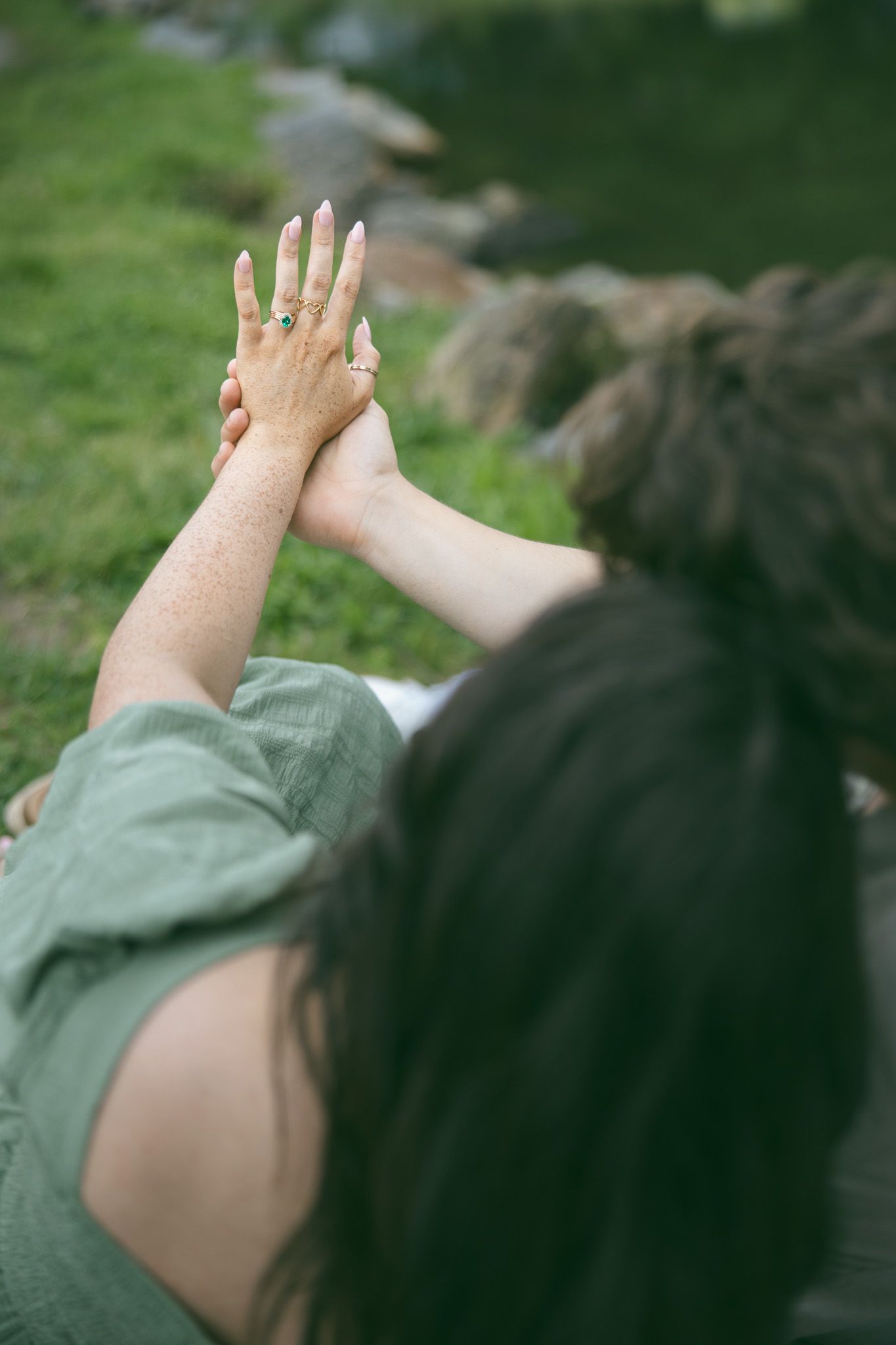 looking at ring proposal engagement couple romantic asheville photographer