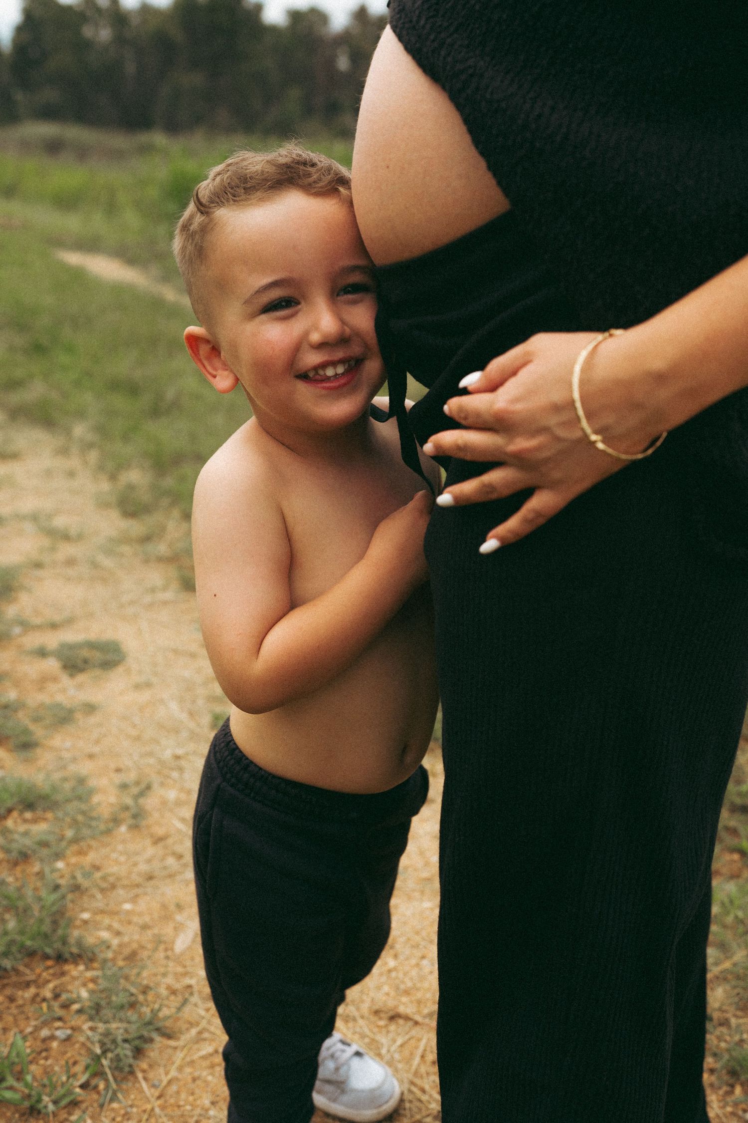 Candid moments of joy and laughter captured on a sunny outdoor path.