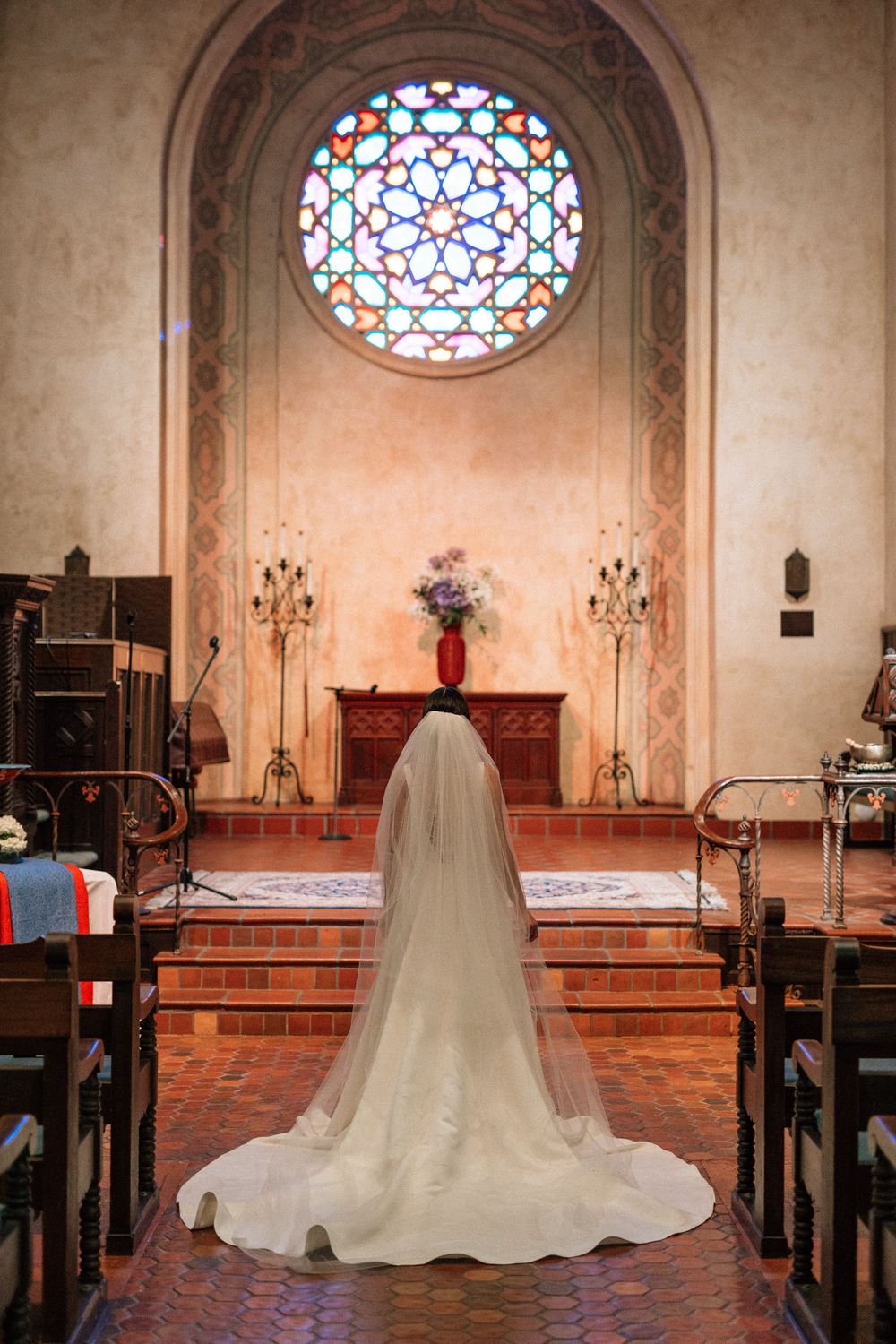 Film photo showing the texture of the bride's veil inside the chapel of Unitarian Society of Santa Barbara.